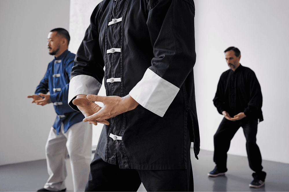 side-view-people-practicing-tai-chi-indoors